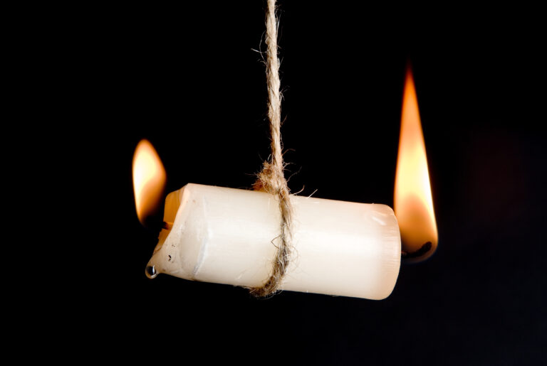Candle burning at both ends